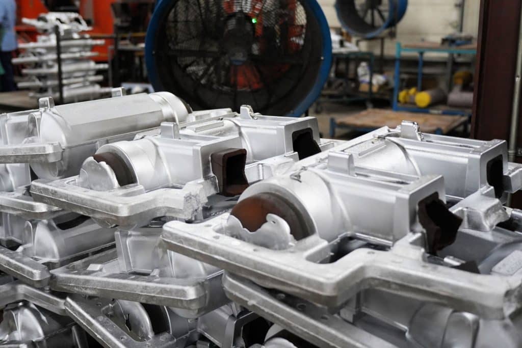 image of aluminum castings made for agricultural equipment by Alcast Company